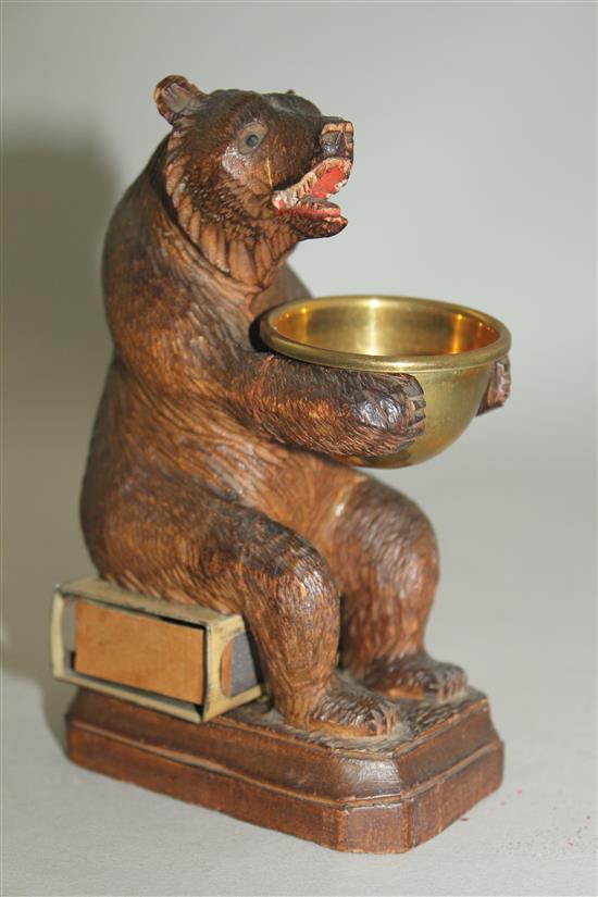 A Black Forest carved bear match tidy, 5.5in.